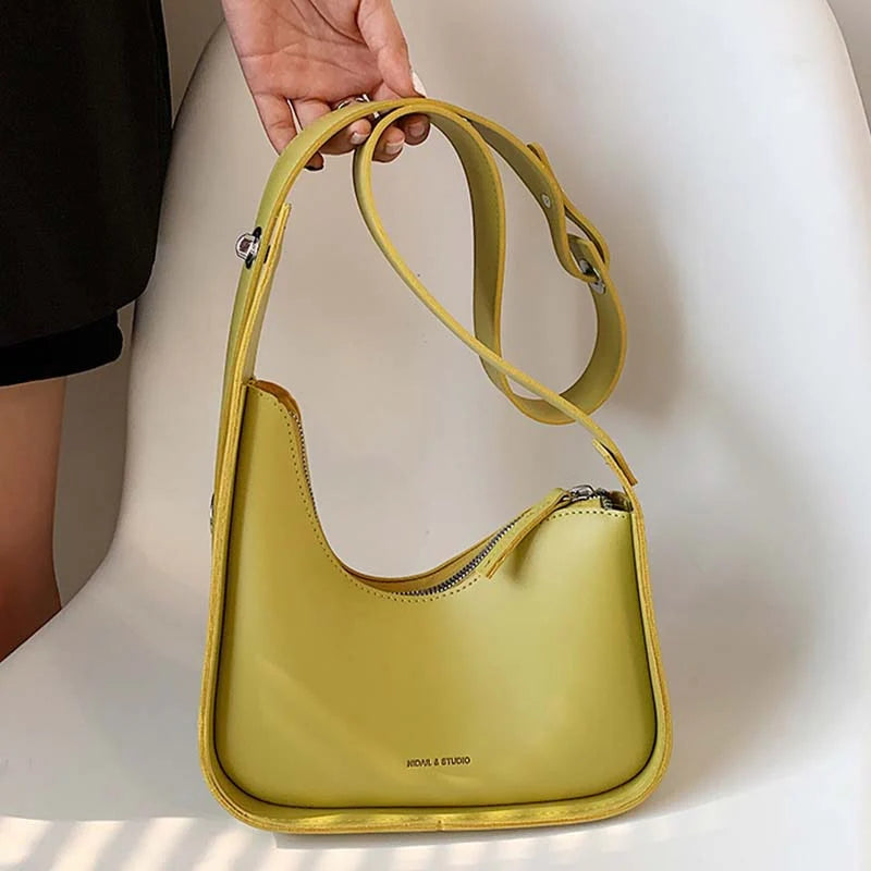 Bolso de mano media luna